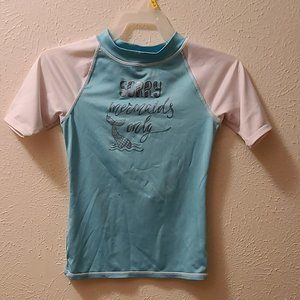 Teal colored rashguard